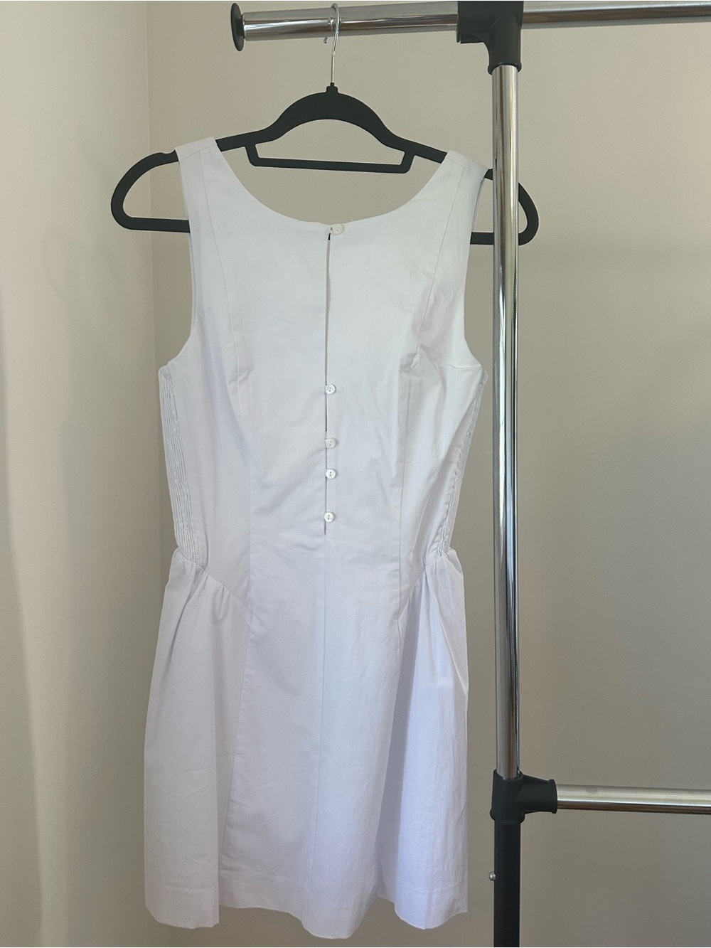 Sleeveless White Mini Dress with Button-Back Detail